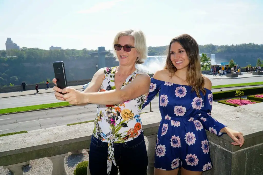 Niagara Falls tour from Toronto with guests taking photo at Niagara Falls