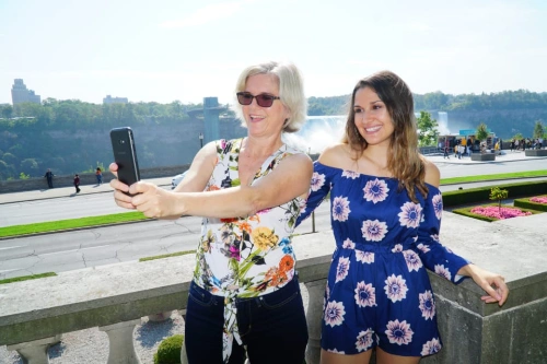 guests taking photo at Niagara Falls, Canada