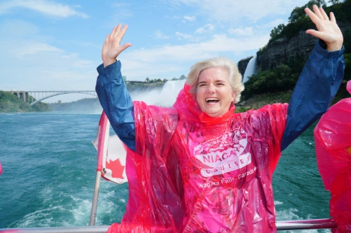 Niagara Falls tour guest on horn blower boat in Niagara Falls